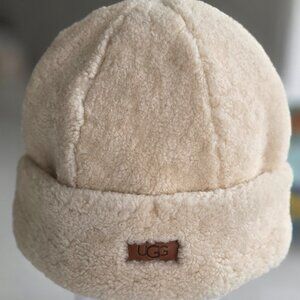UGG Women's Curly Sheepskin Cuff Hat in the color Cliff S/M